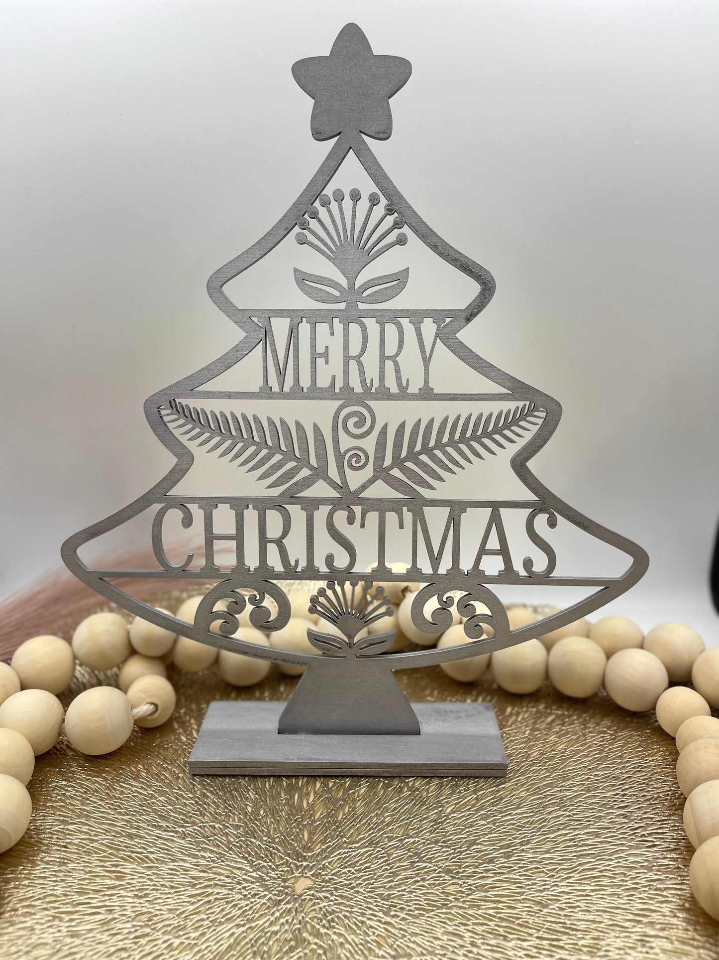 Maori silver standing tree decoration.