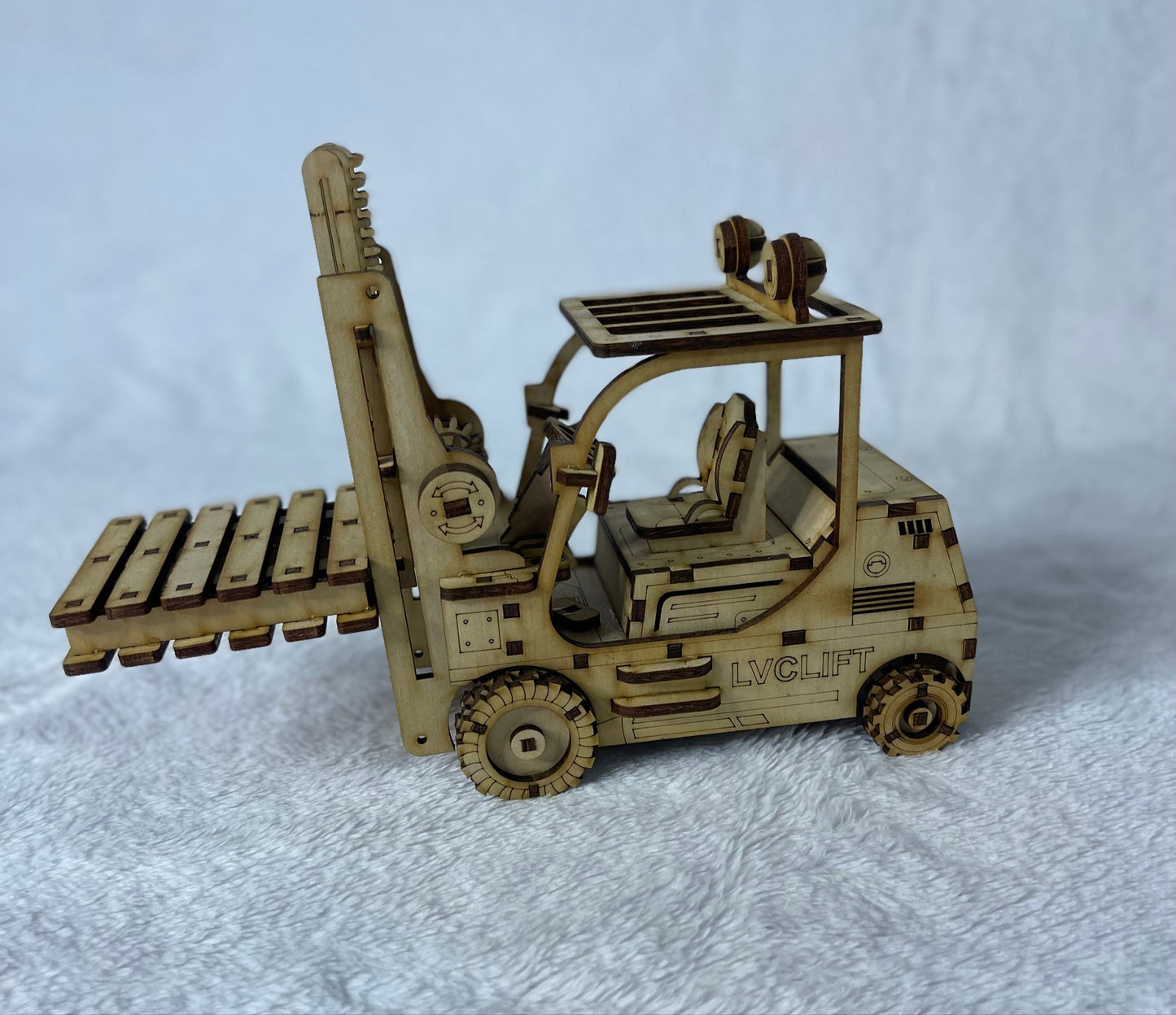 Forklift with 2x Coaster pallets